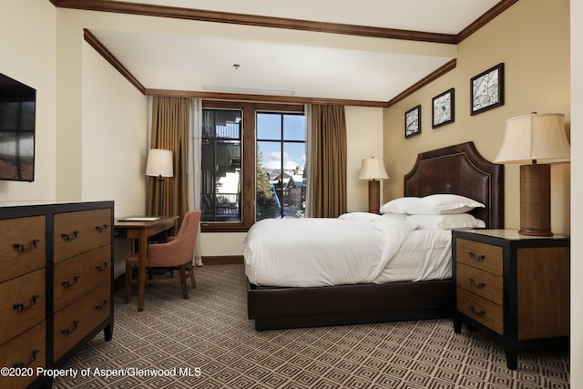 bedroom featuring carpet floors and ornamental molding