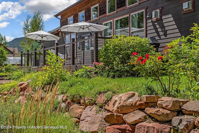 64 White Peaks Ln, Glenwood Springs, CO 81601 - view of yard with a deck with mountain view