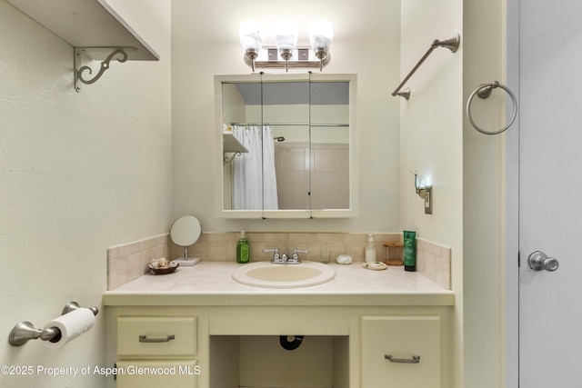 bathroom featuring vanity and a shower with curtain