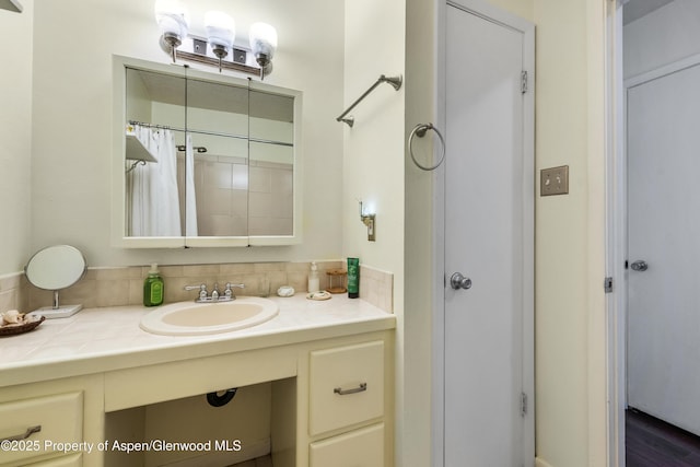 full bath featuring vanity