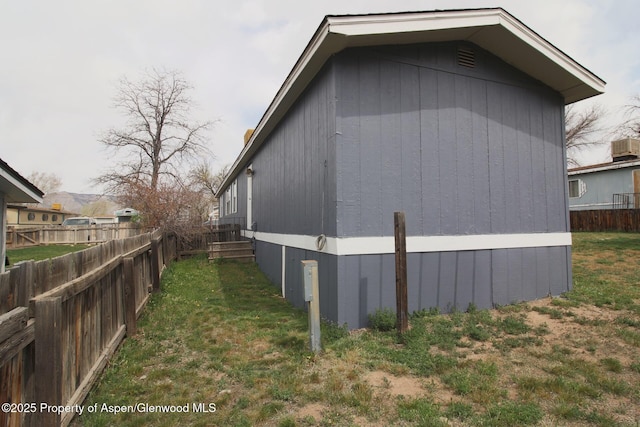 22 W Silver Bell Pl, Parachute, CO 81635 - view of side of property featuring a yard and fence