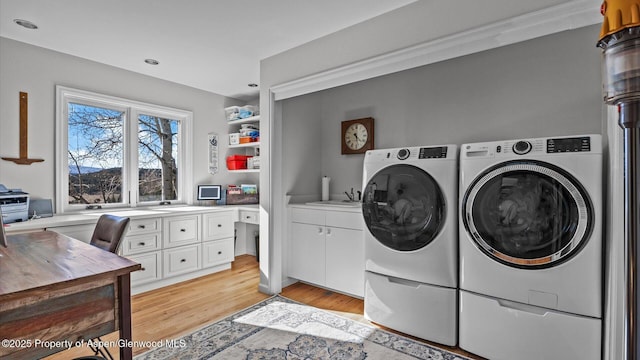 3 Red Wing Ln, Carbondale, CO 81623 - washroom with a sink, cabinet space, independent washer and dryer, light wood-style floors, and recessed lighting