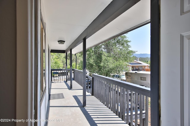 balcony featuring a mountain view