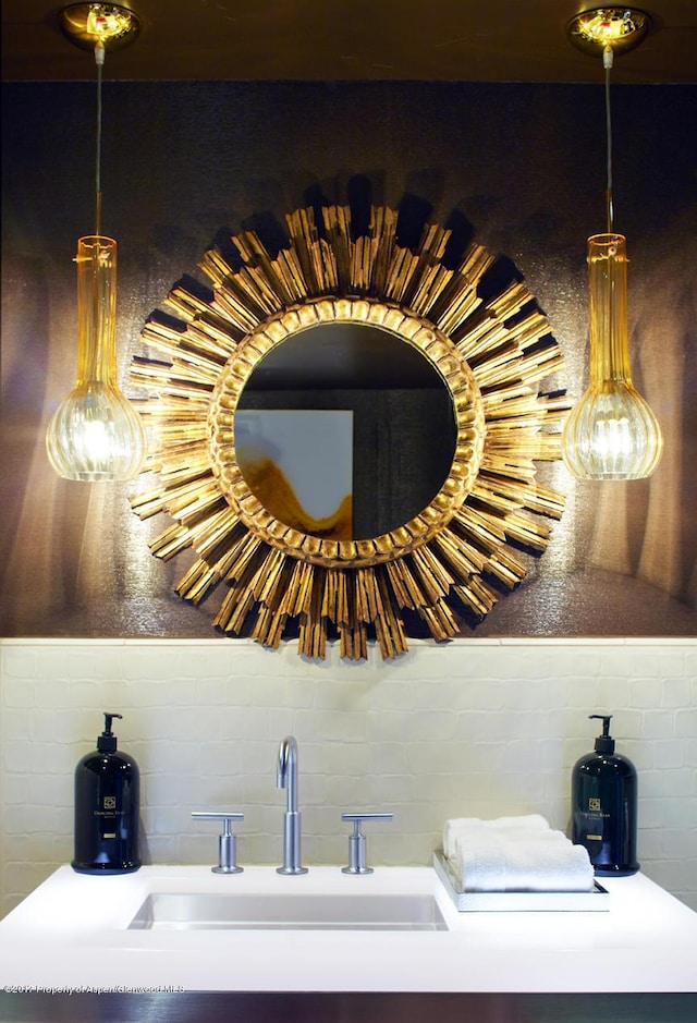 411 S Monarch St Unit H8, Aspen, CO 81611 - bathroom view of a sink and decorative backsplash