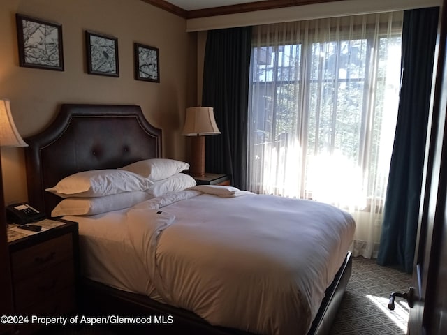 bedroom featuring ornamental molding