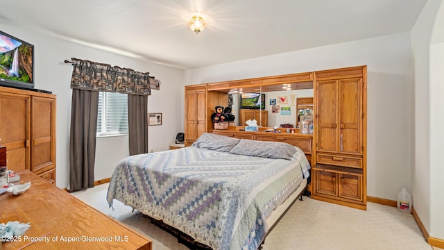 1300 Johnson Way, Craig, CO 81625 - bedroom with light colored carpet and baseboards