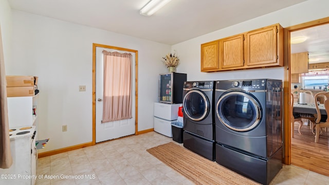 1300 Johnson Way, Craig, CO 81625 - laundry room with cabinet space and washing machine and dryer