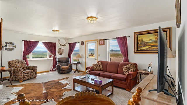 1300 Johnson Way, Craig, CO 81625 - carpeted living area featuring baseboards