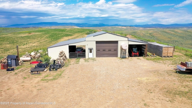 1300 Johnson Way, Craig, CO 81625 - garage with a garage and a mountain view