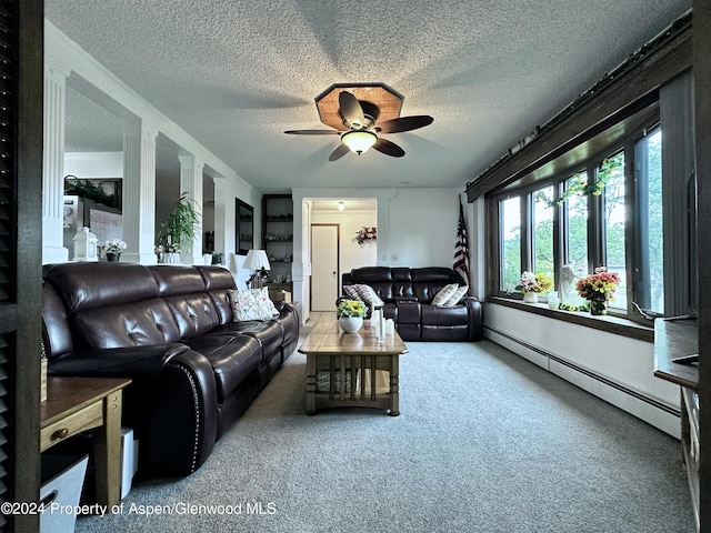 carpeted living room featuring plenty of natural light, ceiling fan, a textured ceiling, and a baseboard heating unit