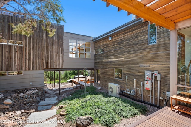 view of property exterior featuring ac unit