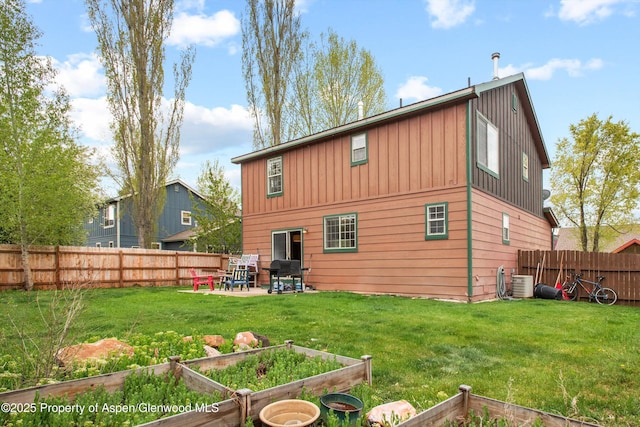 121 Ranch Creek Ln, Carbondale, CO 81623 - back of property featuring a garden, board and batten siding, and a patio