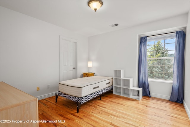 121 Ranch Creek Ln, Carbondale, CO 81623 - bedroom featuring light wood-style flooring and baseboards