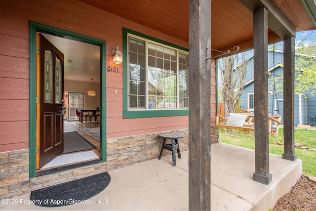 121 Ranch Creek Ln, Carbondale, CO 81623 - doorway to property featuring a porch