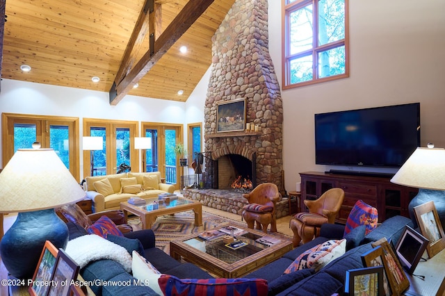 living room featuring high vaulted ceiling, french doors, a fireplace, beam ceiling, and wood ceiling