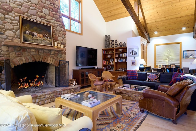 living room with wooden ceiling, high vaulted ceiling, hardwood / wood-style flooring, a fireplace, and beam ceiling