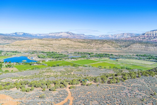 4472 V 5/10 Rd, De Beque, CO 81630 - view of mountain backdrop with a nearby body of water