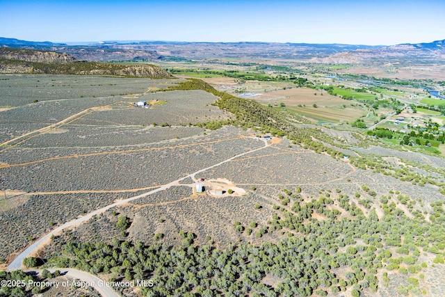 4472 V 5/10 Rd, De Beque, CO 81630 - view of property location with mountains and rural landscape