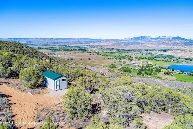 4472 V 5/10 Rd, De Beque, CO 81630 - view from above of property featuring a water and mountain view