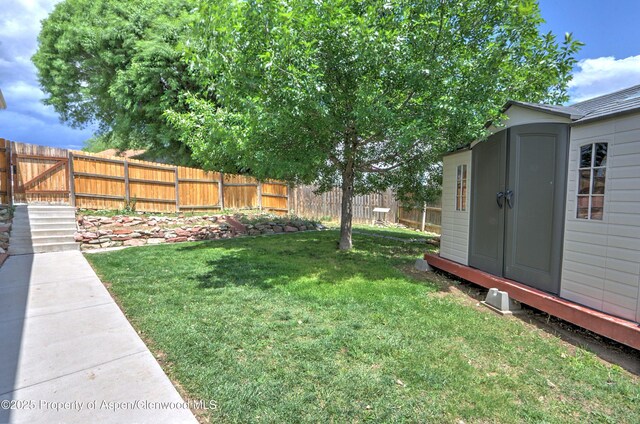 222 Creek Ct, Rifle, CO 81650 - fenced backyard with a storage shed