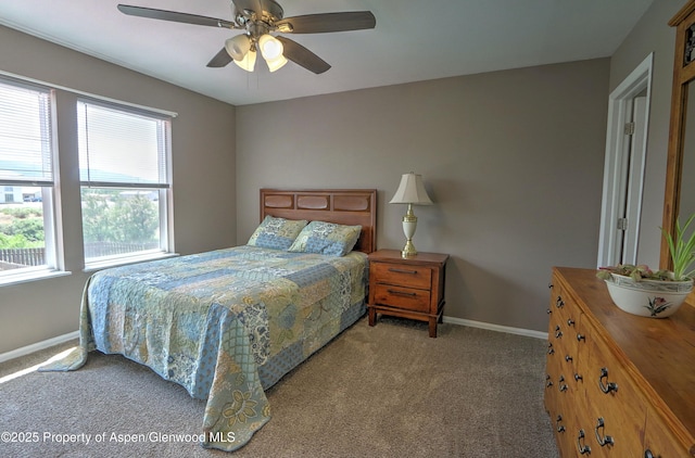 222 Creek Ct, Rifle, CO 81650 - carpeted bedroom featuring baseboards and a ceiling fan