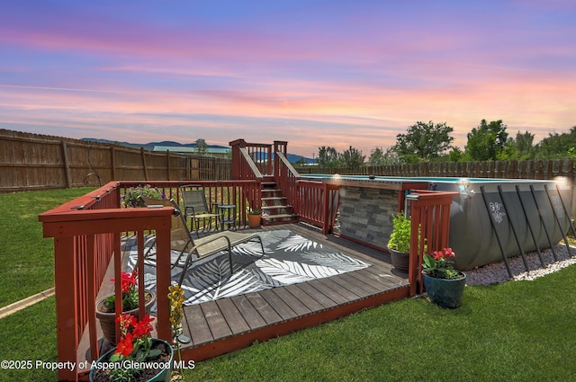 222 Creek Ct, Rifle, CO 81650 - wooden terrace featuring a fenced backyard