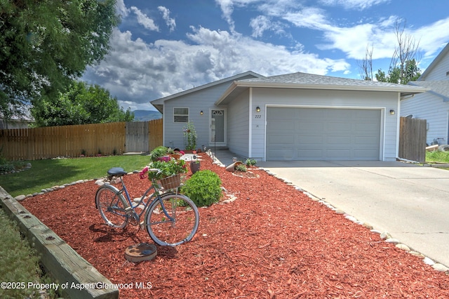 222 Creek Ct, Rifle, CO 81650 - view of front of property featuring concrete driveway and a garage