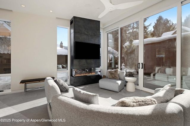 211 W Main St, Aspen, CO 81611 - living area with plenty of natural light, a ceiling fan, and recessed lighting
