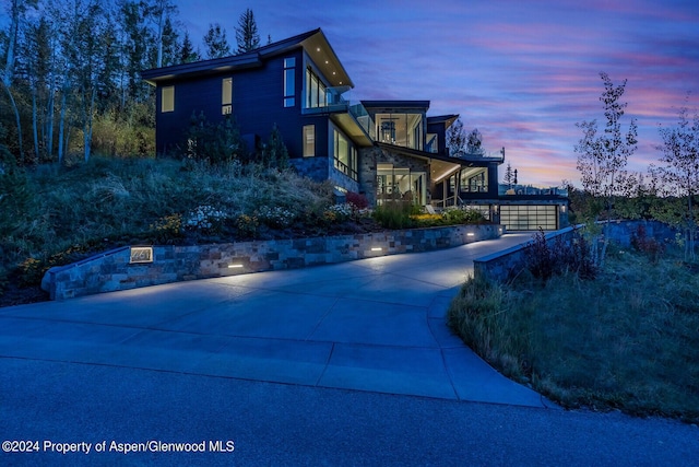 view of property exterior at dusk