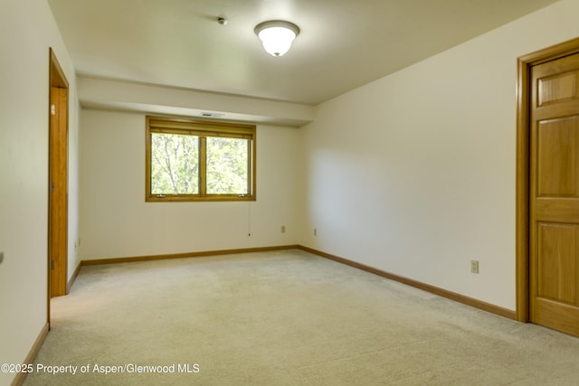 201 14th St Unit 300, Glenwood Springs, CO 81601 - unfurnished room with light colored carpet and baseboards