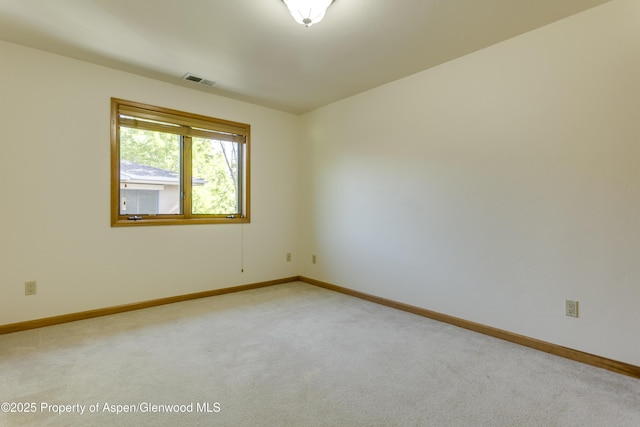 201 14th St Unit 300, Glenwood Springs, CO 81601 - carpeted spare room featuring baseboards