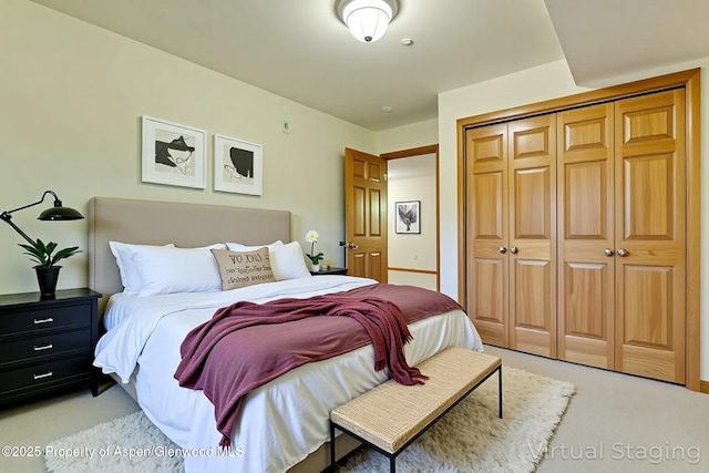 201 14th St Unit 300, Glenwood Springs, CO 81601 - bedroom with light carpet and a closet