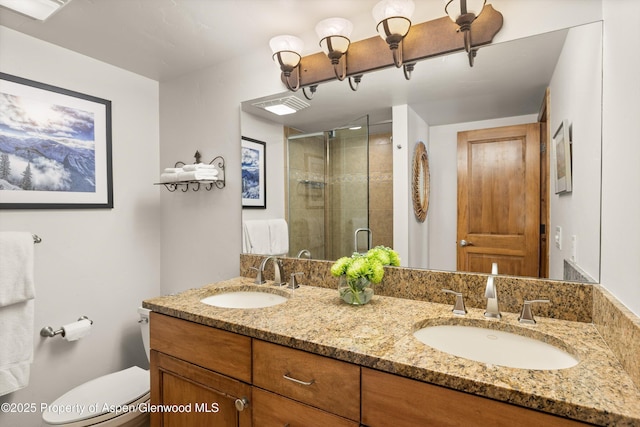 1039 E Cooper Ave Unit 21, Aspen, CO 81611 - full bathroom with double vanity, a stall shower, and toilet