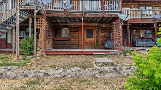 200 S E Ave Unit 111, New Castle, CO 81647 - rear view of property with log exterior and a wooden deck