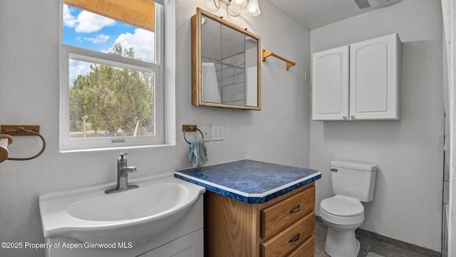 2051 Grass Mesa Rd, Rifle, CO 81650 - full bath with vanity, toilet, and curtained shower