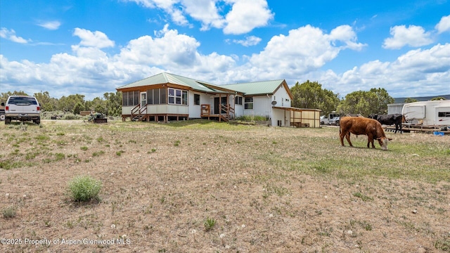 2051 Grass Mesa Rd, Rifle, CO 81650 - rear view of house with metal roof