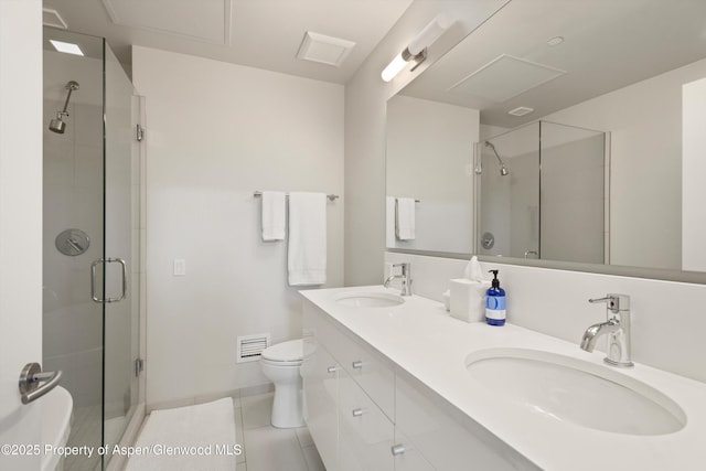 full bathroom with a sink, visible vents, toilet, and a stall shower