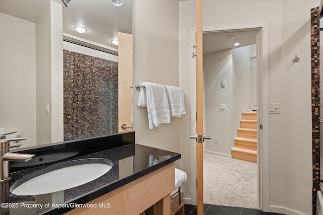 322 Park Ave, Aspen, CO 81611 - bathroom featuring vanity, a shower, tile patterned flooring, recessed lighting, and baseboards