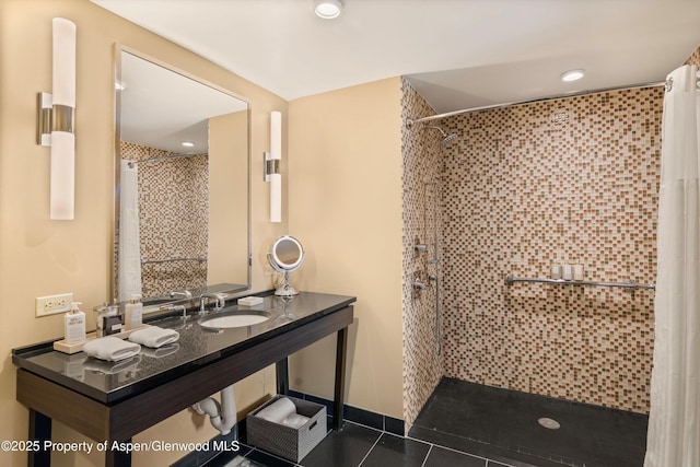 bathroom with sink, tile patterned floors, and a shower with curtain