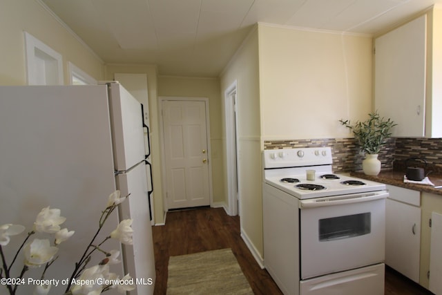 kitchen featuring decorative backsplash, dark hardwood / wood-style flooring, ornamental molding, white appliances, and white cabinetry