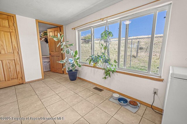 5904 County Road 31, Craig, CO 81625 - interior space with baseboards and light tile patterned floors