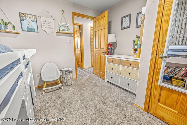 5904 County Road 31, Craig, CO 81625 - bedroom featuring light colored carpet and baseboards