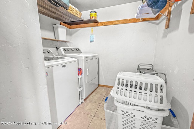 5904 County Road 31, Craig, CO 81625 - washroom featuring independent washer and dryer and light tile patterned floors