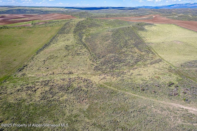 5904 County Road 31, Craig, CO 81625 - overview of rural landscape featuring a mountain backdrop