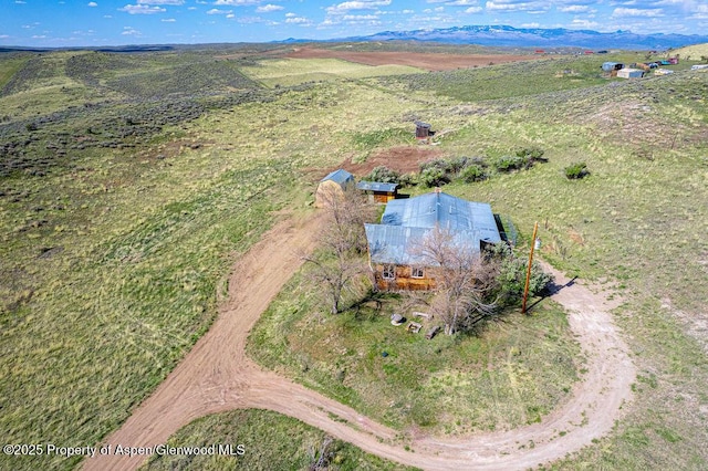 5904 County Road 31, Craig, CO 81625 - aerial view of sparsely populated area with a mountain backdrop