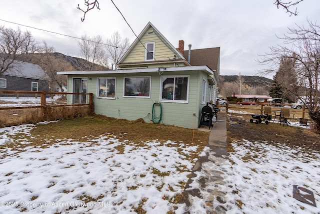 view of snow covered property