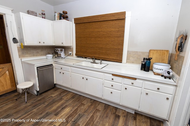 kitchen with sink, white cabinetry, tasteful backsplash, dark hardwood / wood-style floors, and dishwasher