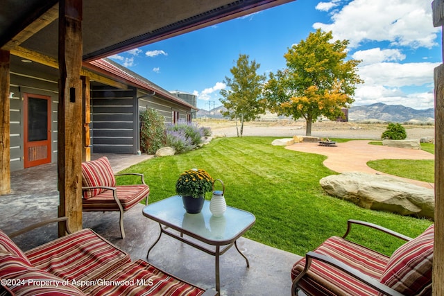 view of patio with a mountain view