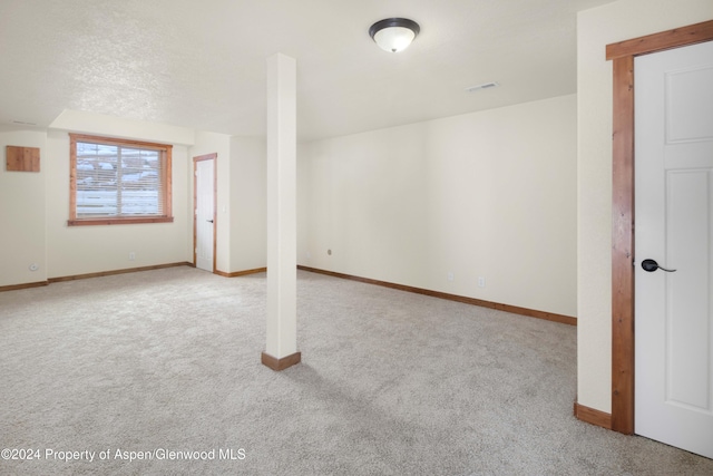 bonus room with light carpet