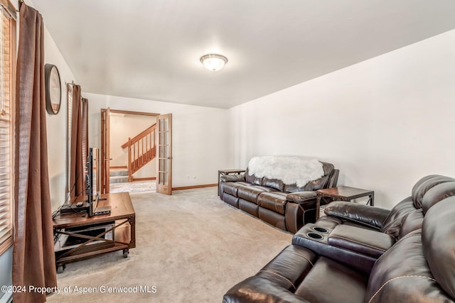 living room with light colored carpet